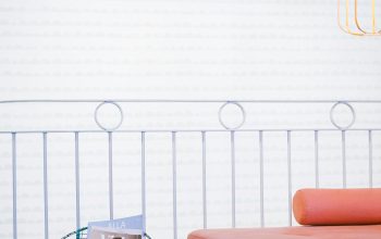 Wallpaper Orange Couch with Throw Pillows