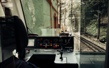 Wallpaper The Inside of a Bus with a Forest View
