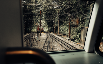 Wallpaper A View of a Train Track from Inside a Vehicle