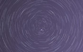 Wallpaper A Circle of Stars in the Night Sky