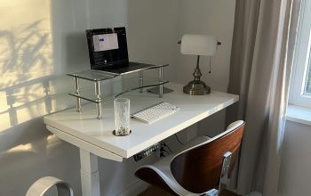 Wallpaper A Desk with a Computer on It