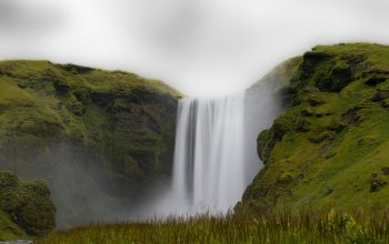 Wallpaper A Waterfall in a Valley