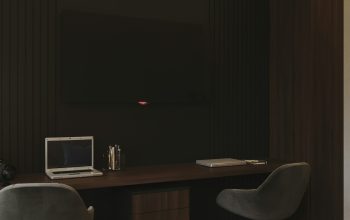 Wallpaper A Desk, Chair, and Television