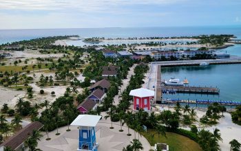 Wallpaper Aerial View of Beach with Pier and Buildings