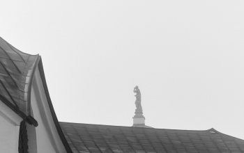 Wallpaper A Black and White Clock Tower