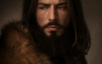 Wallpaper A Man with Long Hair and a Beard Wearing a Fur Coat