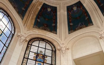 Wallpaper The Ceiling of a Grand Building with Stained Glass Windows