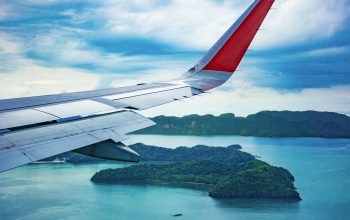 Wallpaper Airplane Wing Over Water