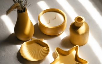 Wallpaper A Group of Yellow Objects on a Table
