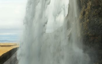 Wallpaper A Geyser Spewing Out Water Into the Air