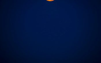 Wallpaper A Full Moon in the Sky