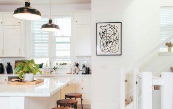 Wallpaper A Kitchen with a Wooden Floor and White Walls