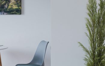 Wallpaper A Table and Chairs with a Painting